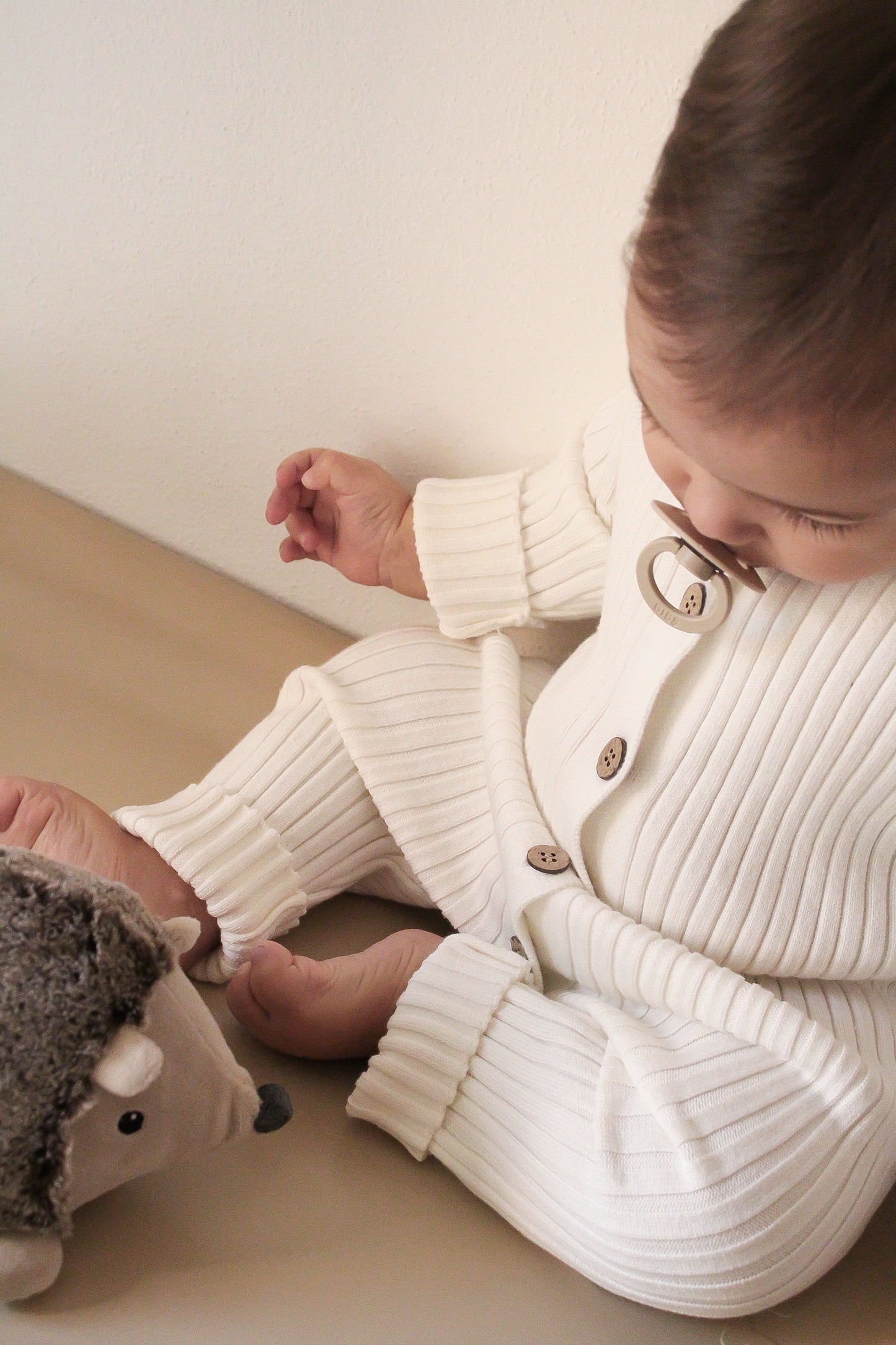 Tutina in maglia a costine - Bianco Latte