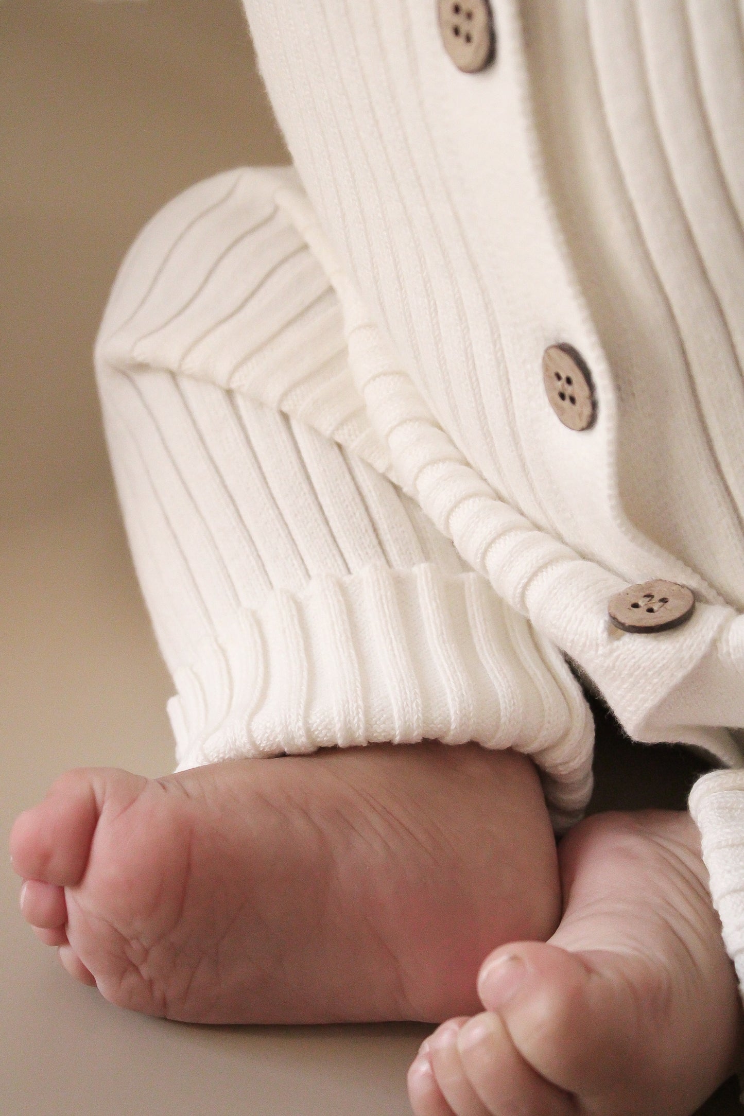 Tutina in maglia a costine - Bianco Latte