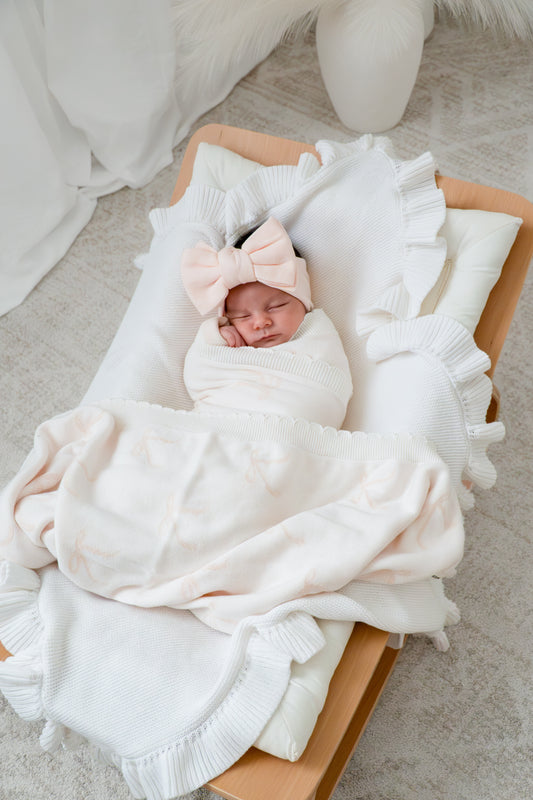 Coperta in maglia a fiocchi | Rosa