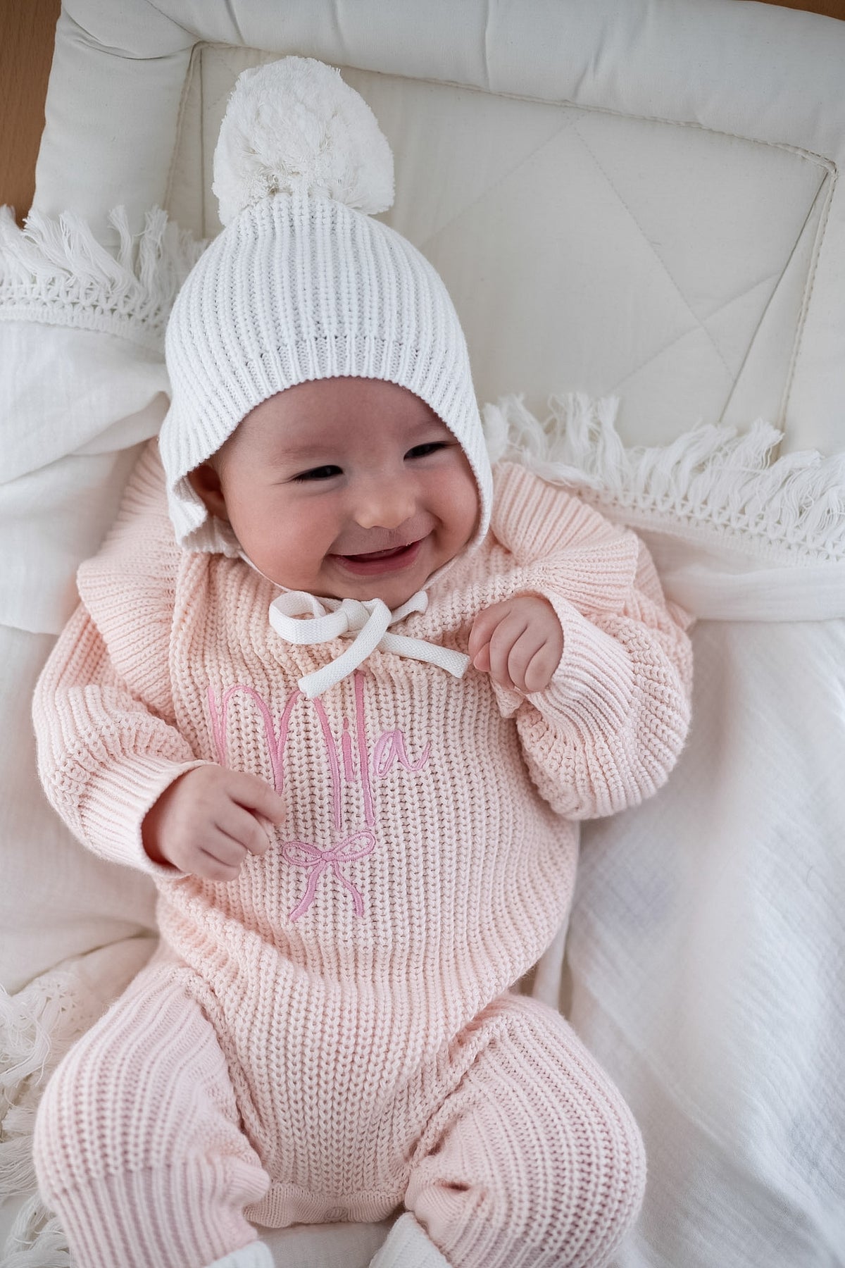 Cuffia in maglia a costine con pompon | Latte