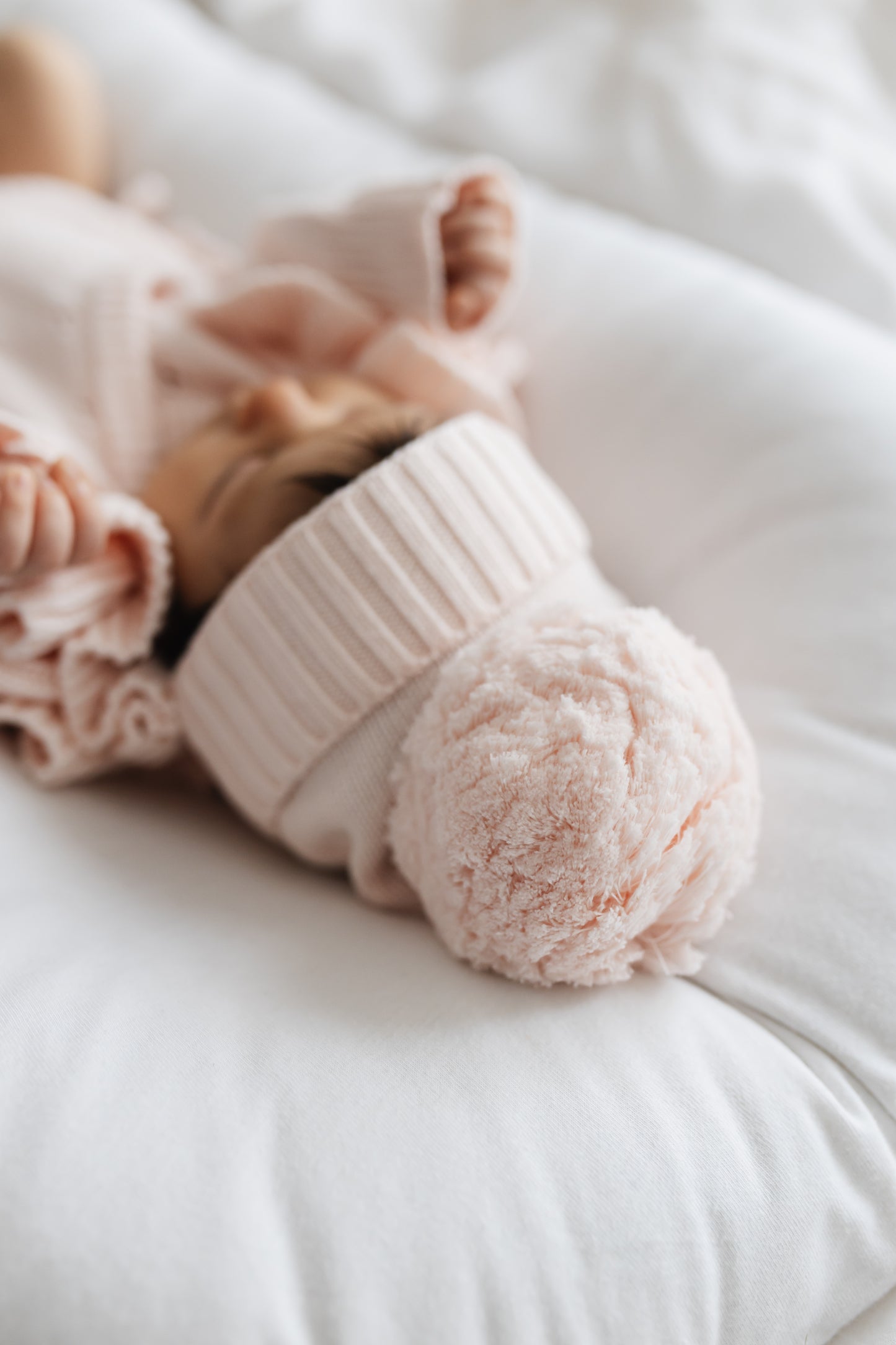 Cappellino Pompon in maglia traforata | Rosa