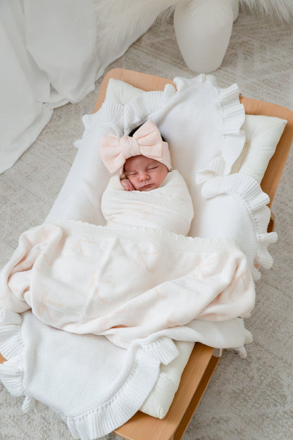 Coperta in maglia a fiocchi | Rosa