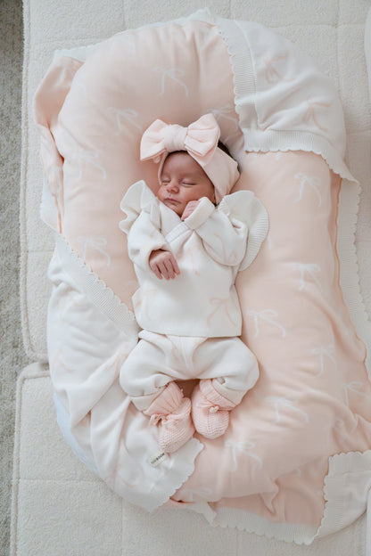 Coperta in maglia a fiocchi | Rosa