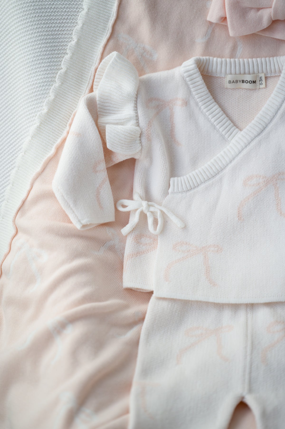 Completo in maglia a fiocchi con volant | Rosa
