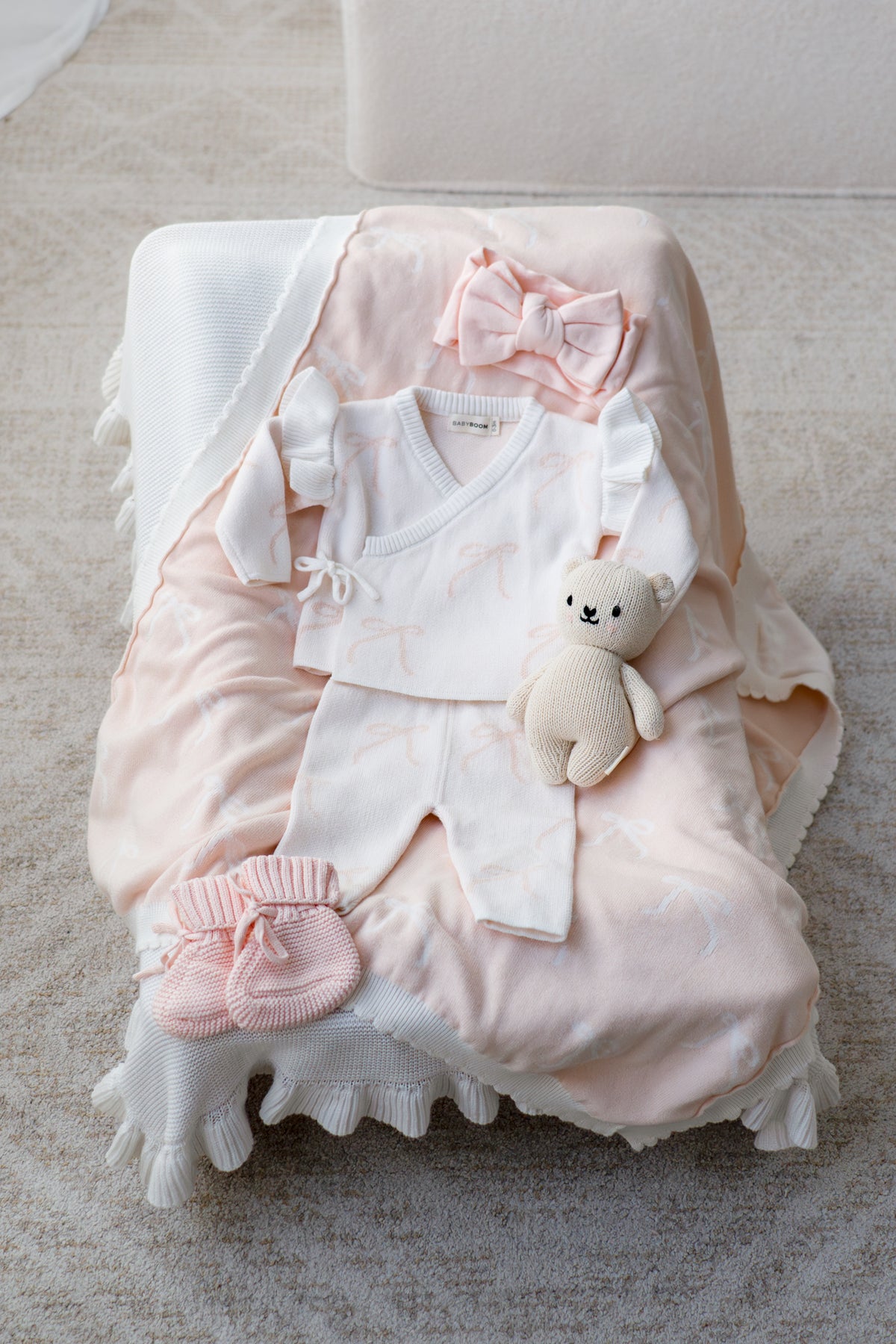 Completo in maglia a fiocchi con volant | Rosa