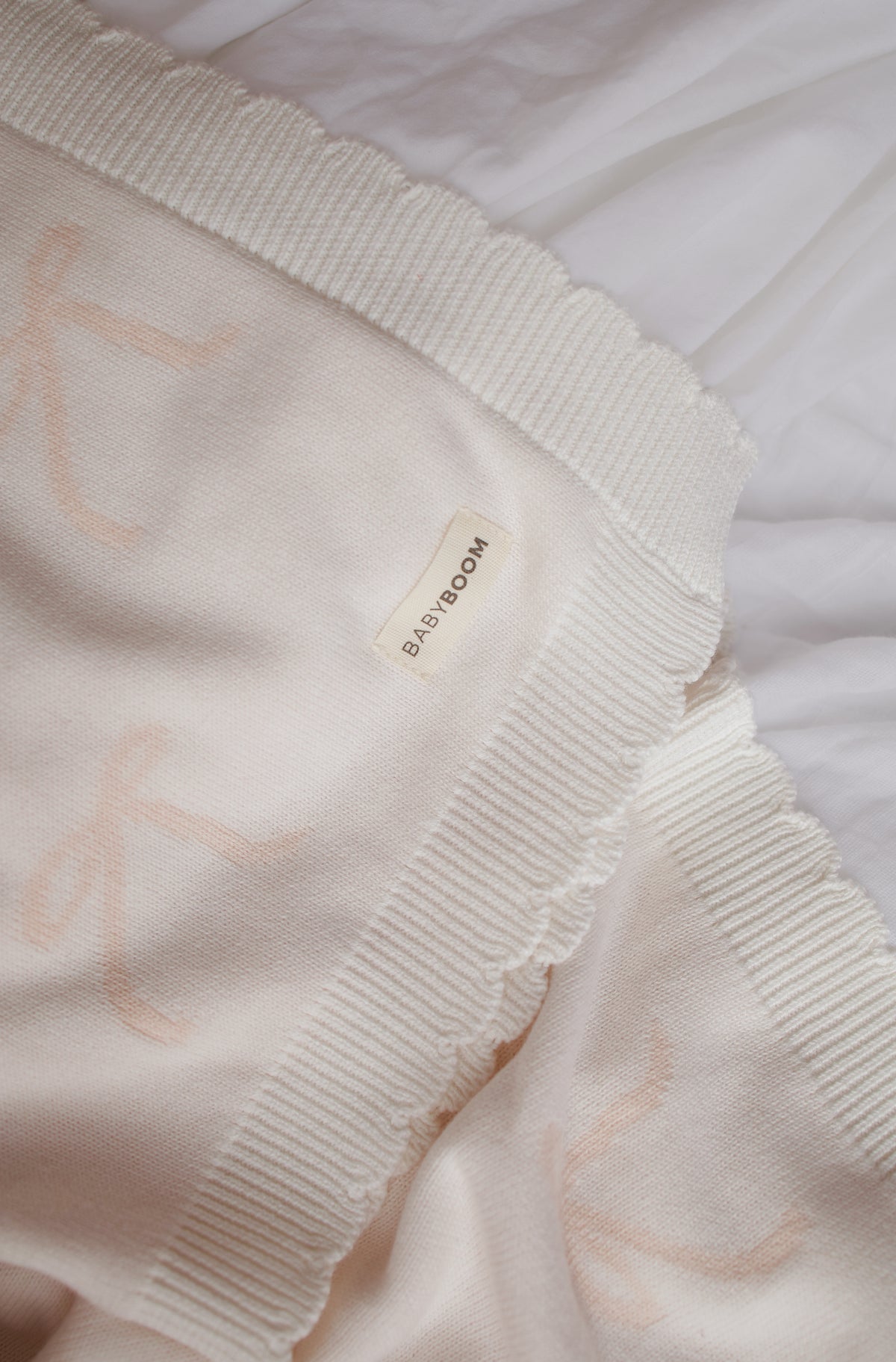 Coperta in maglia a fiocchi | Rosa