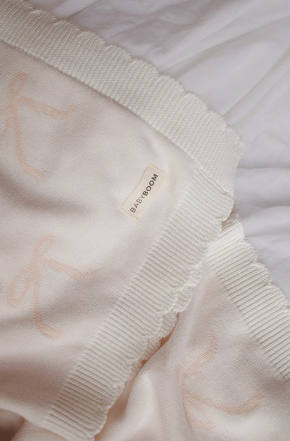 Coperta in maglia a fiocchi | Rosa